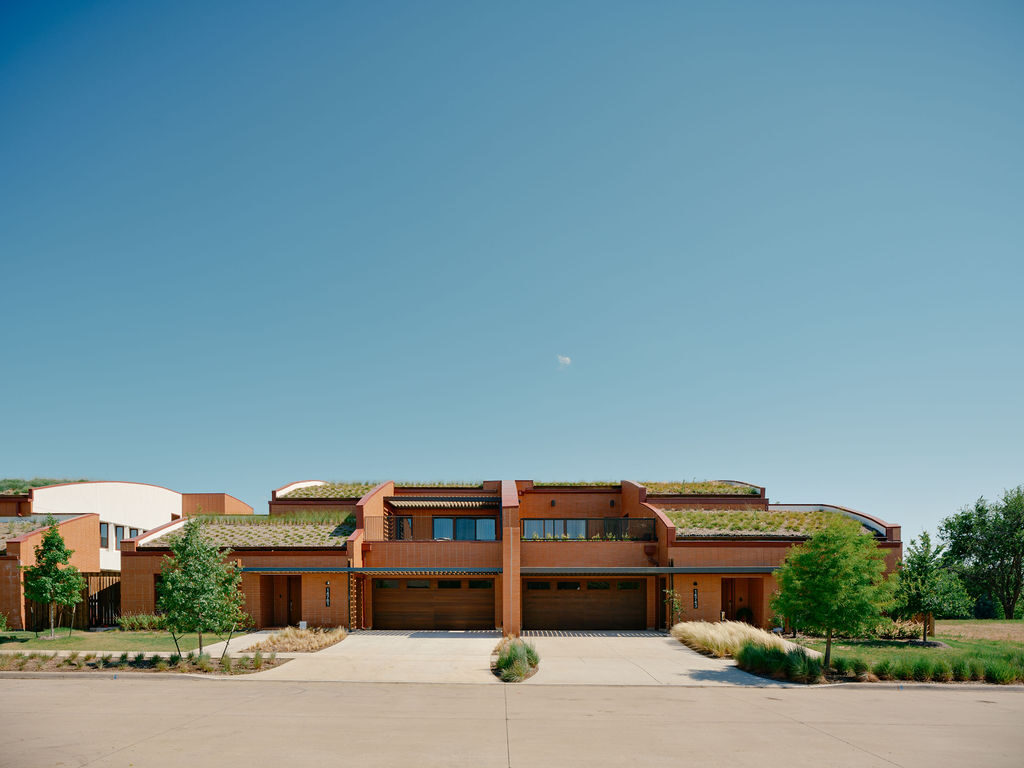 Home exterior with mature landscaping and architectural design