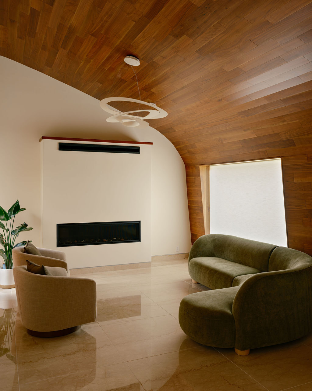 Contemporary living room with curved wood ceiling and modern furnishings
