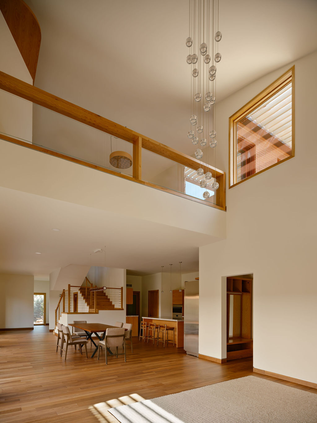 Multi-level workspace with elegant pendant chandelier